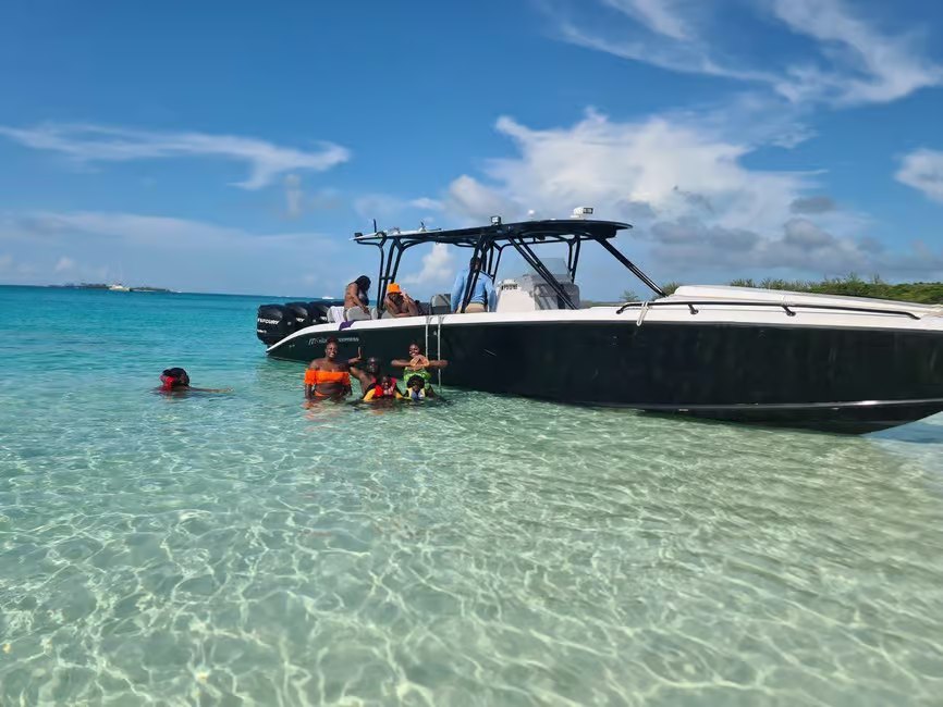 A powerboat running between snorkeling stops near Nassau