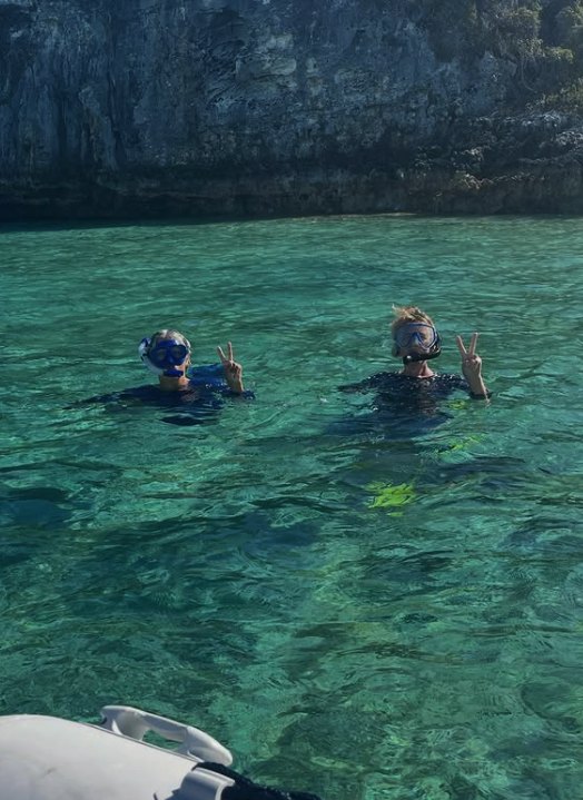 Snorkellers in the water on a Nassau reef trip
